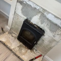 Insert stove with back boiler