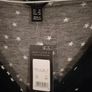 New look black Dress with white star pattern and v neck. New with tags. Image 3
