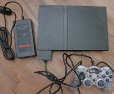 Playstation 2 slim - PS2 slim (works well)