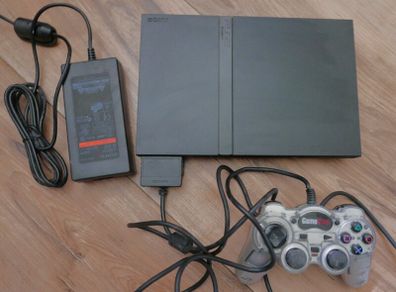 Playstation 2 slim - PS2 slim (works well)