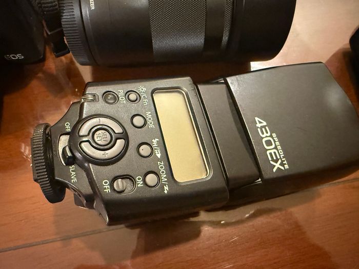 Canon EOS M6 Mark II, 2,100 shots, EVF-DC2, 15-45 + 55-200 + 28-135, flash, bags