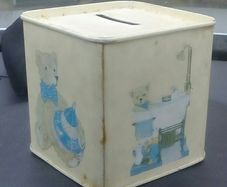 A Vintage Armstrong & Claydon, Oscar And Bertie Money Box Tin Ware