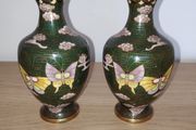 2 enamelled vases with butterflies