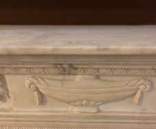 Marble Fireplace and Black Granite Hearth
