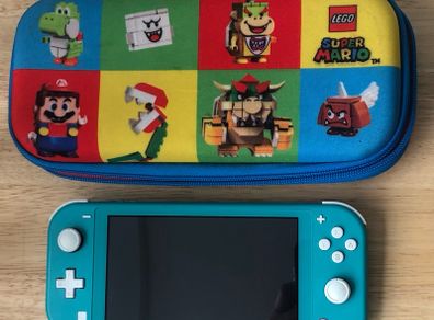 Nintendo Switch Lite with Pokemon Sword & Lego Mario Case