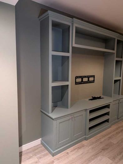 Large custom-built fitted media wall / TV unit in very good used condition.