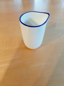 White and blue creamer