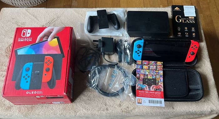 Nintendo Switch OLED, Used Twice + New Case + 4 Screen Protectors