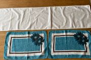 White table runner and 2 blue napkins