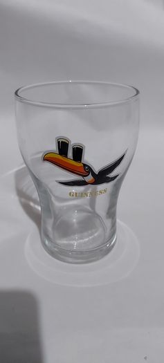 guinness glass with toucan,see pictures for condition good,,