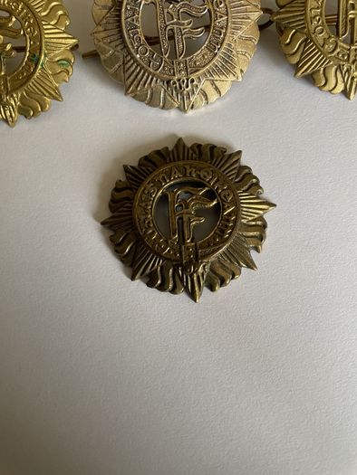 Irish Army cap badges three brass one staybrite