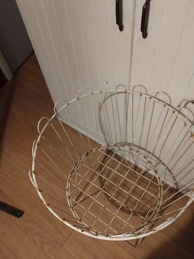 Circular Iron shop stand.