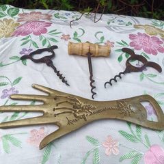 A Trio of Victorian Cork Screws and Brass Hand Bottle Opener