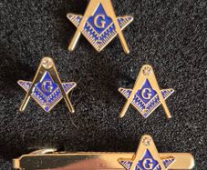 Masonic set, tie pin, lapel badge and cufflinks.