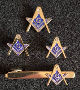 Masonic set, tie pin, lapel badge and cufflinks.