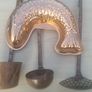 Vintage-style copper cookware and kitchen accessories. Image 5