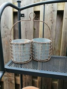 Zinc flower pots in holder
