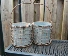 Zinc flower pots in holder