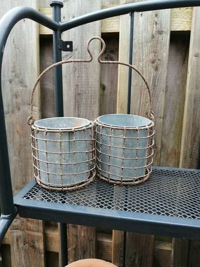 Zinc flower pots in holder