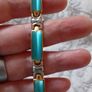 Bracelet & Clip on Brooch Set, Silver, Gold & Vibrant Teal in Colour Image 2