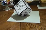 Photo cube revolving