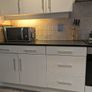 Kitchen with black granite worktop Image 6