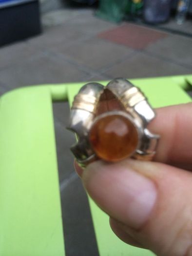 A lovely silver and gold ring with Amber stone