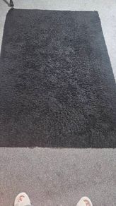 Black shaggy fluffy rug
