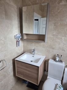 Bathroom floating sink unit and cupboard