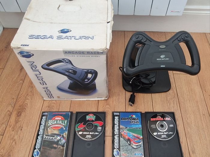 Sega Saturn w/ 3D Control Pad, Arcade Racer, Lightgun and Games