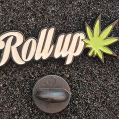 Roll up ,  pin back badge.