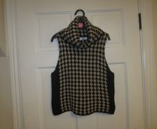 Sleeveless turtle neck   size Small