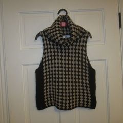 Sleeveless turtle neck   size Small
