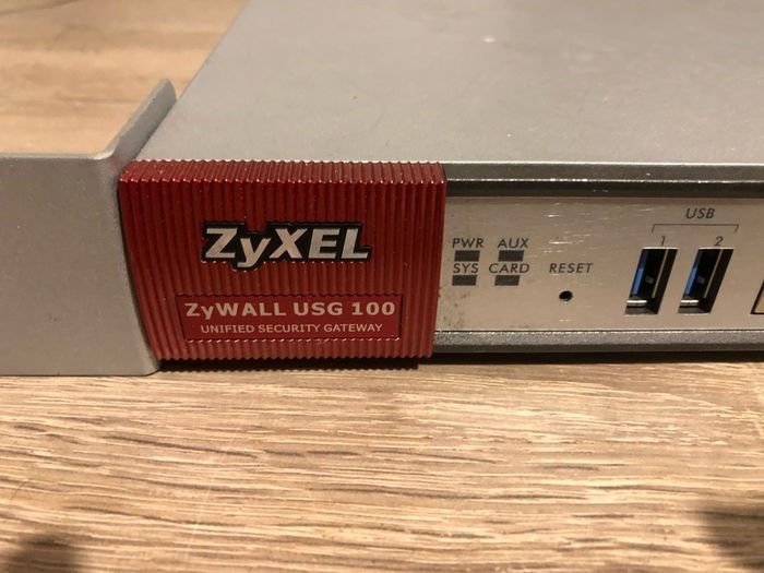 Two ZyXel USG 100 Router/ unified security gateway