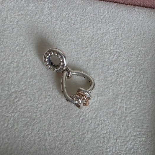 Pandora  heart highlights charm with rose gold middle dangle heart and purple CZ