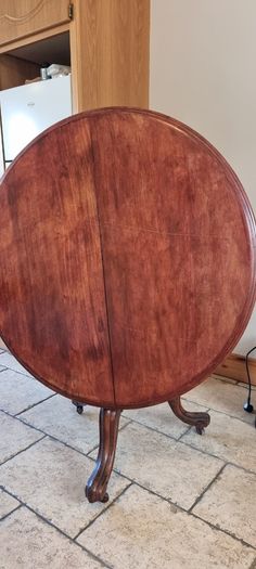 Mahogany tilt top table