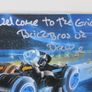 LEGO Ideas TRON Legacy Set 21314 Signed By Brick Bros UK With Poster And Signed Postcard And Rare Lego I Love London Tile Brick Leicester Square Signed By Designers BrickBros UK Pre 31st Release Early Launch And Also there is A Rare Blue Brick Lego Bag On Image 4