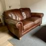 Natuzzi brown leather two seater sofa Image 2