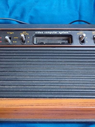 Atari 2600 'woody' console set with ganes