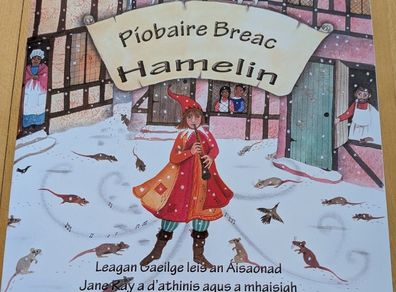 Piobaire Breac - brand new - as Gaeilge - less than half price