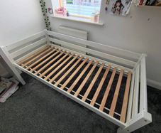 Loft bed with mattress.