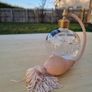 Stuart crystal perfume bottle with atomizer and pink fringe. Image 4