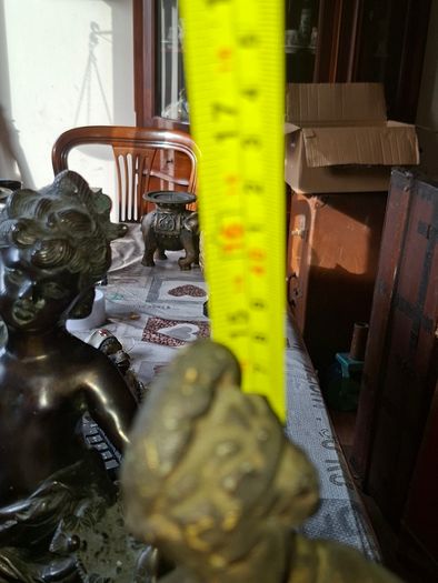 Antique Sculpture a gilt-bronze cast-metal Spanish Conquistador. On his torso is a Cross Pattee, a historical motif commonly associated with Christian military orders and medieval heraldry