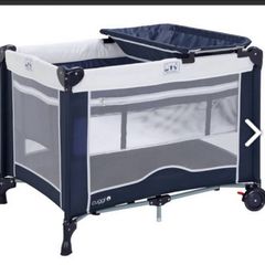 Travel cot with changer