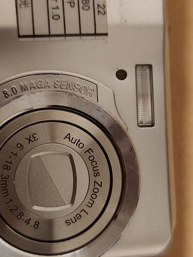 Z880 Digital Camera, Takes 2AA Batteries, working fine, has a modification that doesn't affect its performance