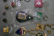 14 pins and 11 key rings from different football associations around the world