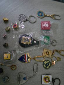 14 pins and 11 key rings from different football associations around the world