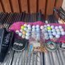 A selection of golf clubs and bags. Golf balls Image 7