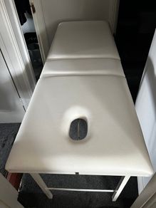 Massage table