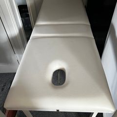 Massage table